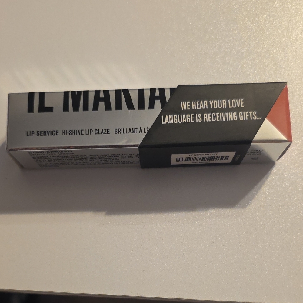 IL MAKIAGE Lip Service Hi-Shine Lip Glaze with Black and White Packaging